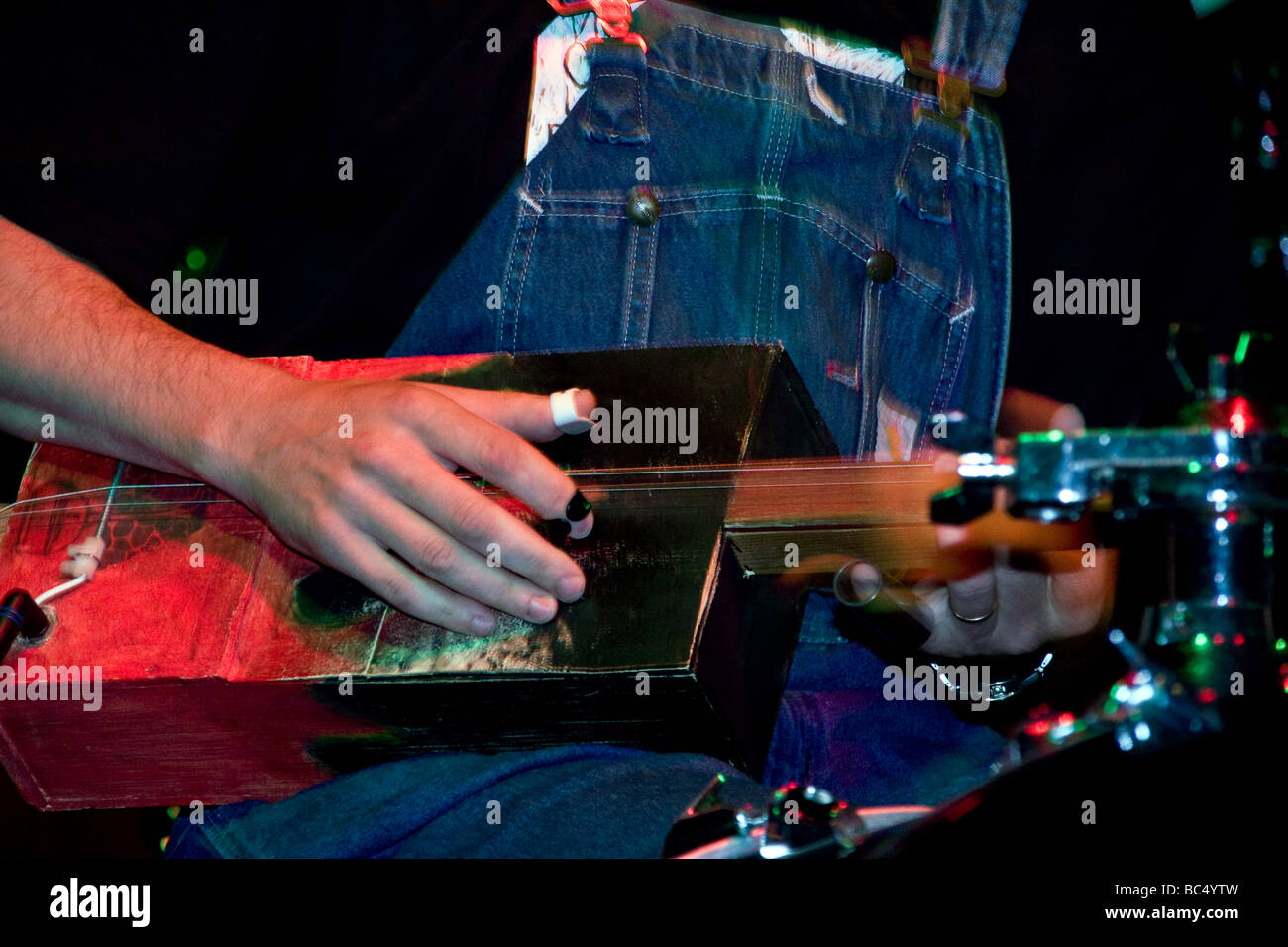 Nikolaj Andersen playing his 3 string guitar at Dexter`s pub in Dundee during the Blues Bonanza 2009,UK Stock Photo